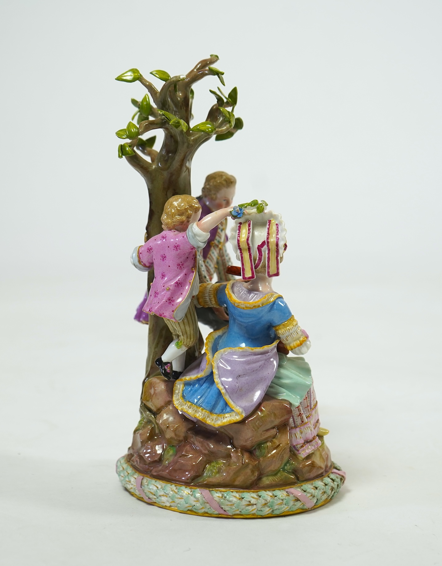 A Meissen porcelain figure group of 'Gardeners' at the Apple Tree', late 19th century